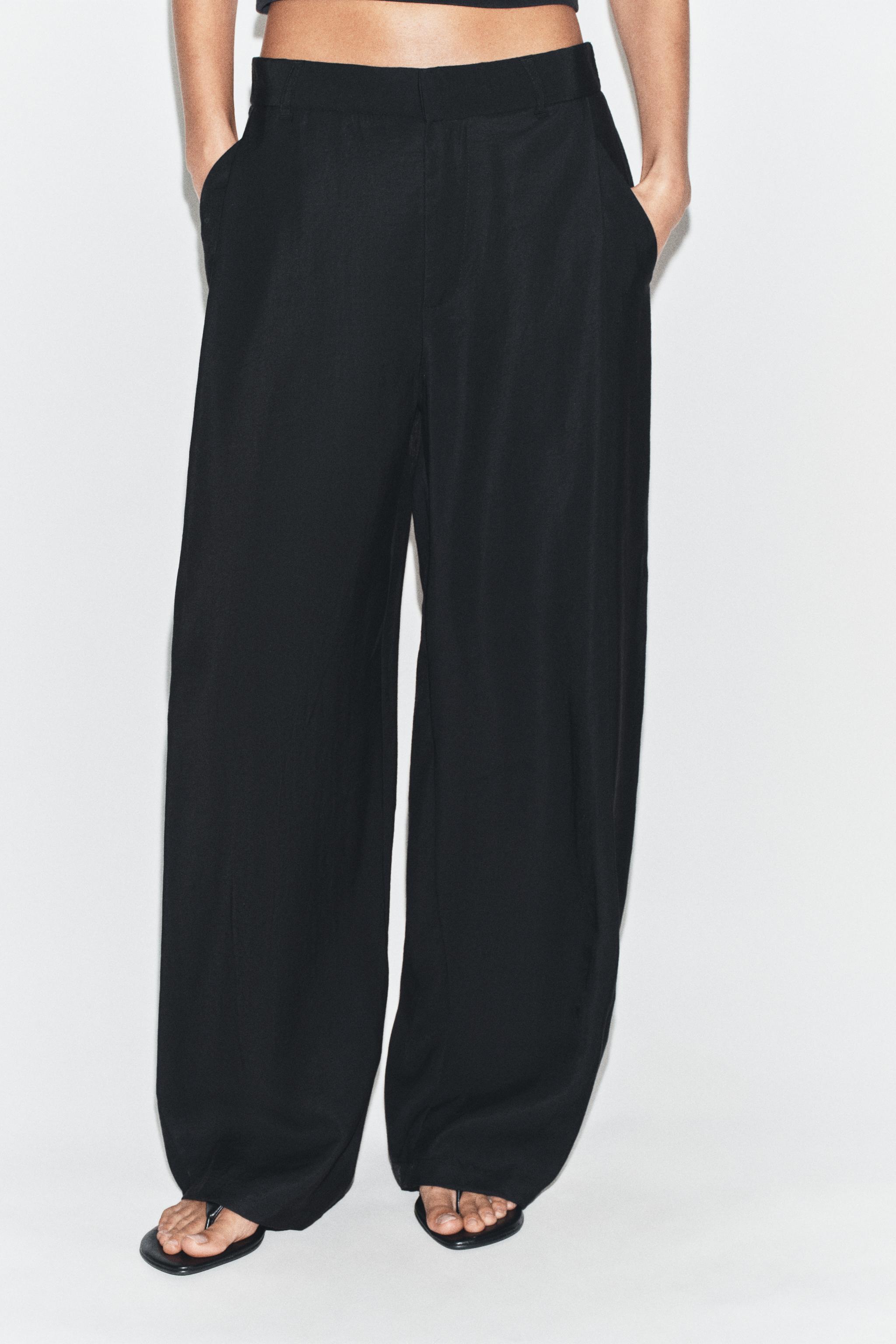 FLOWY PLEATED PANTS